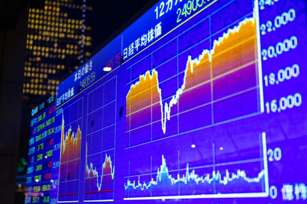 A Electric bulletin board at the business town in Yaezu Tokyo at night. Chuo district Yaezu Tokyo Japan - 11.10.2020 : Translation on neonboard text Japanese Kanji charactor.